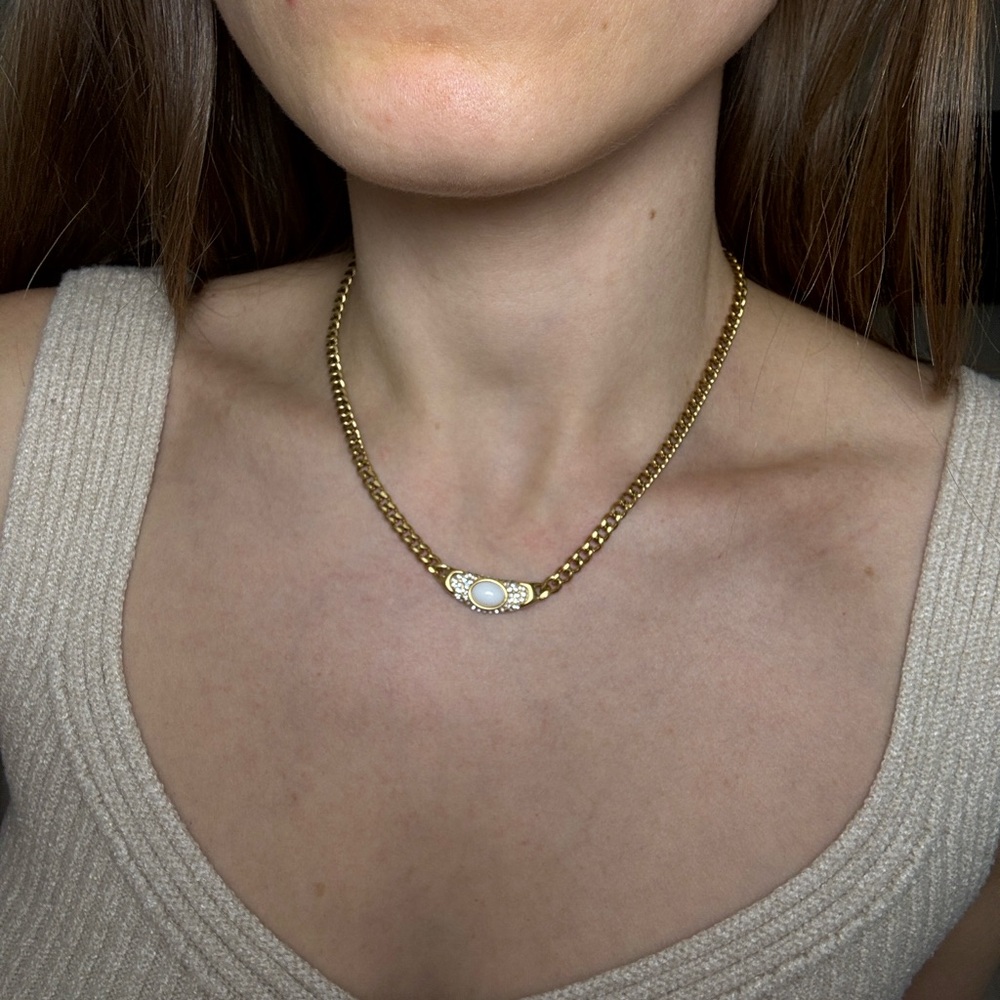 The Ira Elegant Gold necklace with cz stones and white Gemstone